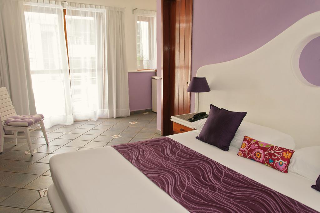 بلايا ديل كارمن Hotel Boutique Quinto Sol الغرفة الصورة